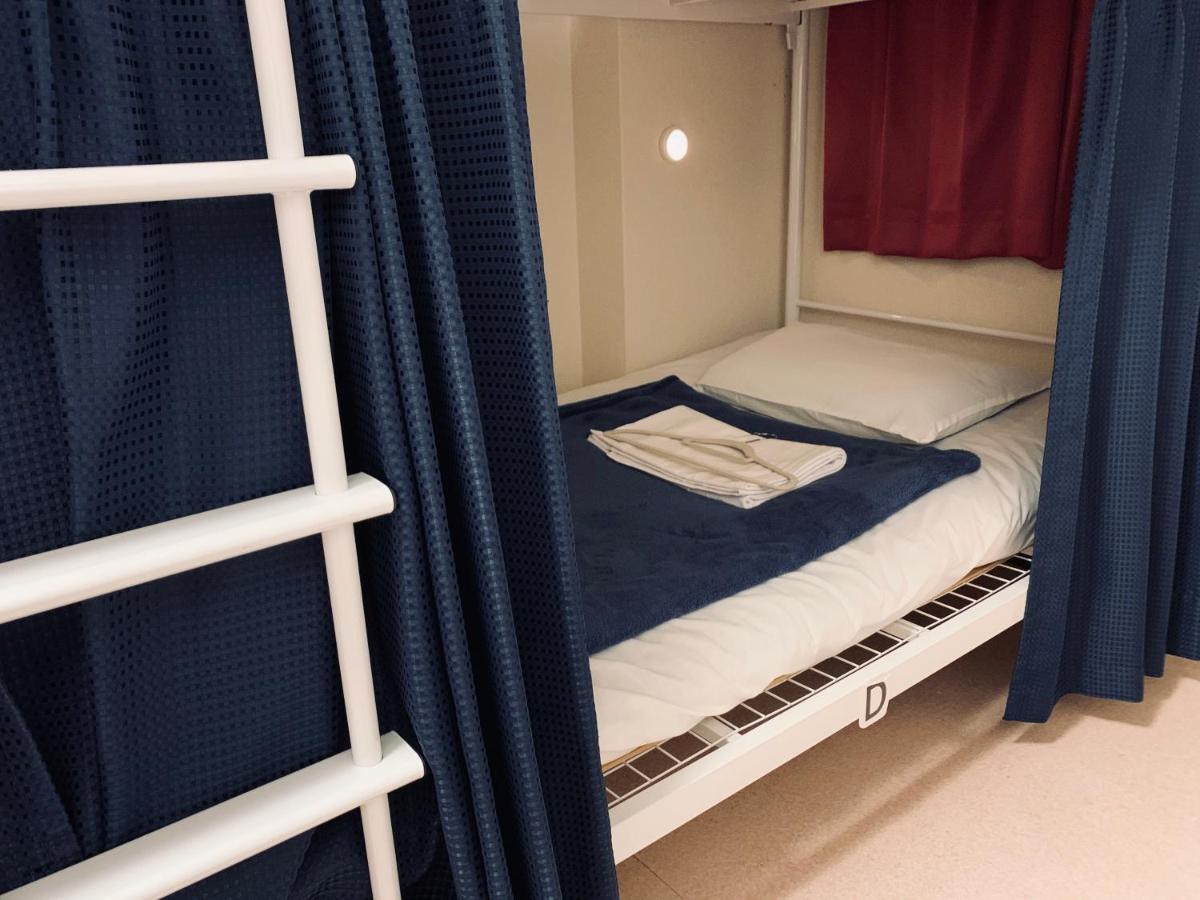 Guesthouse Shiawase Eki Fukuoka  Bagian luar foto