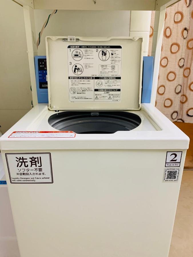 Guesthouse Shiawase Eki Fukuoka  Bagian luar foto
