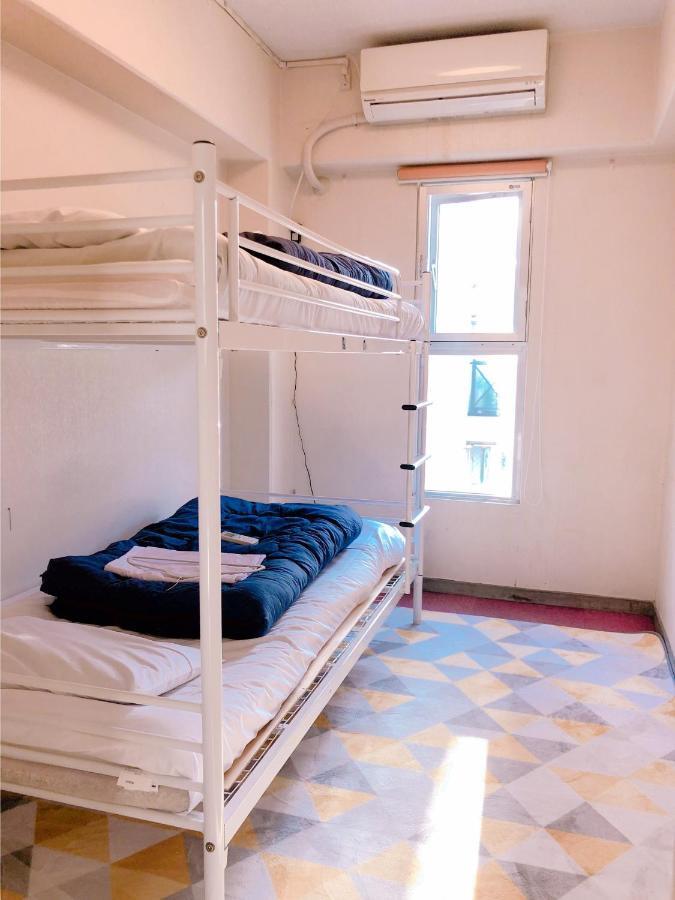 Guesthouse Shiawase Eki Fukuoka  Bagian luar foto